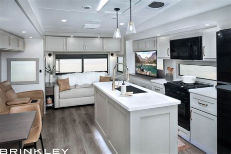 Brinkley campers - Mar 23, 2023 · 13.5k Front AC + Furrion 18k Chill® Cube Rear AC. Basement Utility Access w/ & Motion Lights. Over 100 Cubic Feet of Exterior Storage w/ Tough Ply Liner. Rear Storage Compartment (48”x40”x15”) 2 - Hot/Cold Outdoor Showers (BOTH sides of coach) SPECIFICATIONS: UVW – 11,674 lbs. GVWR – 14,495 lbs. Hitch Weight – 2,081 lbs. 